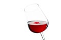 A drop of red wine falls into the glass Royalty Free Stock Photo