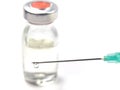 Drop from a syringe needle Royalty Free Stock Photo