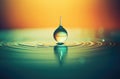 A drop of water on a background of ripples and waves. Royalty Free Stock Photo