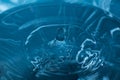 Drop of water. Blue water drop. Falling water. Water splash close-up Royalty Free Stock Photo