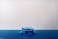 Drop of water, blue water drop, water splash close-up Royalty Free Stock Photo