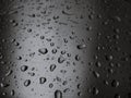 Drop of water Close Up, Macro on GRAY silver metal surface SELECTIVE FOCUS Royalty Free Stock Photo