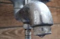 A drop of water coming out of a tap Royalty Free Stock Photo
