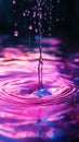 A drop of water dissolves into pink-colored water, creating blurred gradients and a smooth transition in this vibrant Royalty Free Stock Photo