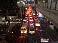Droplet on glass with blur traffic jam at night. Royalty Free Stock Photo