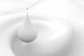 Droplet of milk on white background