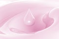 Droplet of pink milk