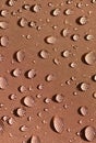 Droplets on brown fabric