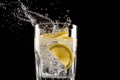 droplets of water falling on a glass of freshly made lemonade