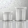 Droplets of water on a wet surface in two clear plastic containers Royalty Free Stock Photo
