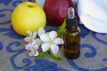 A dropper bottle of apple blossoms extract