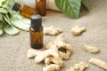 A dropper bottle of ginger essential oil