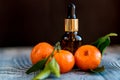 Dropper bottle of mandarin essential oil Royalty Free Stock Photo