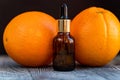 Dropper bottle of orange essential oil Royalty Free Stock Photo