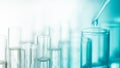 Dropping chemical liquid to test tube, laboratory research and development Royalty Free Stock Photo