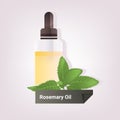 Dropping essential resemary oil glass bottle with yellow liquid and green leaves natural face body beauty remedies