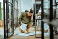 Tired and exhausted businesswoman dropping papers on the floor