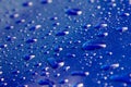Drops on blue background. Royalty Free Stock Photo
