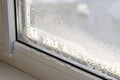 Drops of condensate and black mold on a substandard metal-plastic window Royalty Free Stock Photo