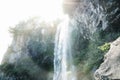 Drops falling from Joengbang waterfall in Seogwipo, Jeju Island, South Korea