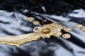Drops of golden paint, polish, lacquer on glossy black background. Royalty Free Stock Photo
