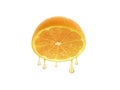 Drops of juice falling from orange half isolated on white background Royalty Free Stock Photo