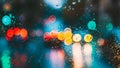 Drops Of Rain Water In Night Or Evening Street Lights On Blue Glass Background. Street Bokeh Lights Out Of Focus. Autumn Royalty Free Stock Photo