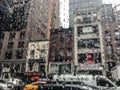 Drops of rain on a window with a city view Royalty Free Stock Photo