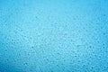 Drops of rain on the window glass. Shallow DOF. Window after rain. Blue Water background with water drops Royalty Free Stock Photo