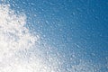 Drops of rain on the window glass. Shallow DOF. Window after rain. Blue Water background with water drops Royalty Free Stock Photo