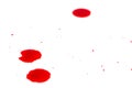 Drops of red blood on white paper