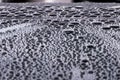 Drops of water on the car roof, abstract nature background Royalty Free Stock Photo