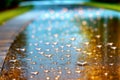 Drops of water falling on the road in the shape of a heart. Royalty Free Stock Photo