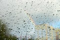 Drops of water on glass on background of rainbow Royalty Free Stock Photo