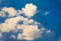 Drops of water on glass window over blue sky. Royalty Free Stock Photo