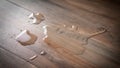 Drops of water on laminate floor Royalty Free Stock Photo