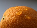 Drops of water on orange. Orange peel - cellulite Royalty Free Stock Photo