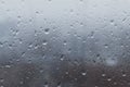 Drops water on window. Spotted abstract texture background. Spring wet weather. Droplets on glass. Fit to autumn