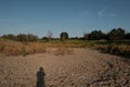 Drought concept shows dry pond in Texas landscape Royalty Free Stock Photo