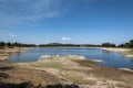 Drought almost empty water reservoir Royalty Free Stock Photo