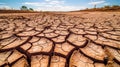 Drought land, dry soil ground in desert area with cracked mud in arid landscape. Shortage of water, climate change, global warming Royalty Free Stock Photo