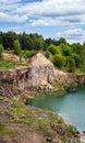 Drowned in flooded basalt querrie excavator Royalty Free Stock Photo