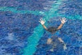 Drowning child in swimming pool asking for help Royalty Free Stock Photo