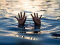 Drowning victims, Hand of drowning man needing help. Royalty Free Stock Photo