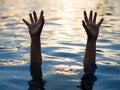 Drowning victims, Hand of drowning man needing help. Royalty Free Stock Photo
