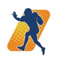 Silhouette of a male american football athlete in action pose. Royalty Free Stock Photo