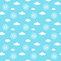 Seamless pattern with white clouds, sun and baby feet on blue background Royalty Free Stock Photo