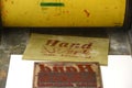 Printing plate and paper sheet with the inscription `Handicraft back then`