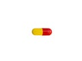 Drug. Capsule, tablet of red and yellow color isolated on a white background. Medicine, pharmaceutical Royalty Free Stock Photo