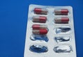 The drug in capsules. Capsules lie in plastic transparent packaging